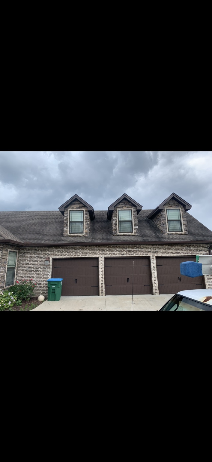 Residential roof before Optimum roof cleaning